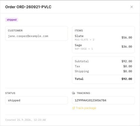 Merchant admin order detail with items, totals and tracking